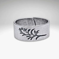 Paintbrush Adjustable Ring in Matte Silver showcasing a wildflower design, symbolizing beauty and nature.
