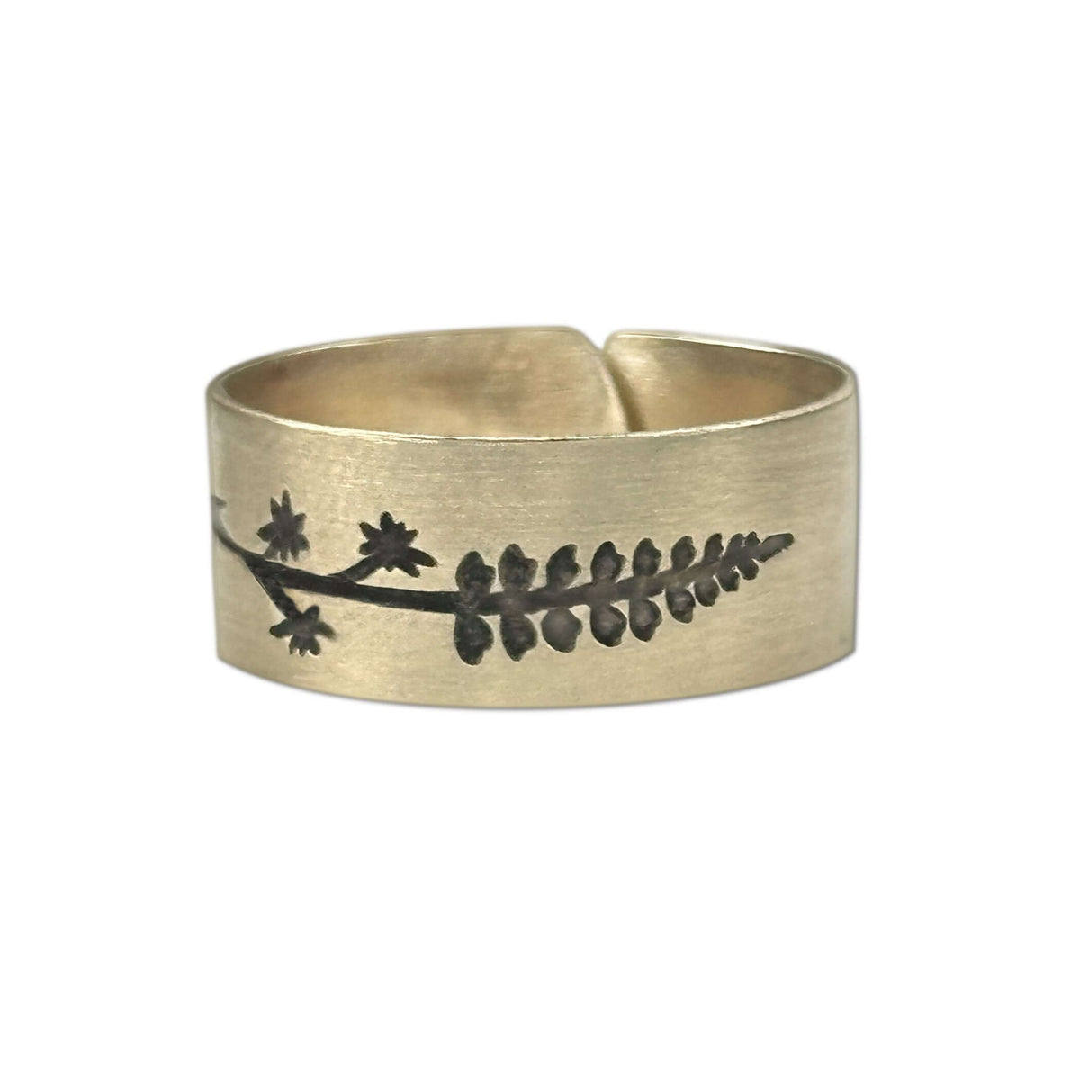 Lupine Adjustable Ring in Antique Brass showcasing Montana wildflower design, adjustable for finger sizes 7 to 11.