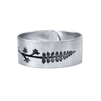 Lupine Adjustable Ring in matte silver featuring a detailed wildflower design, adjustable for sizes 7 to 11.