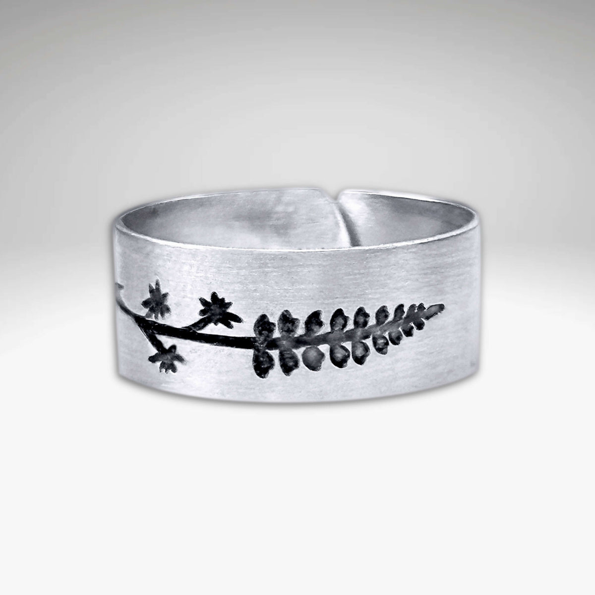 Lupine Adjustable Ring featuring Montana wildflowers in matte silver finish.