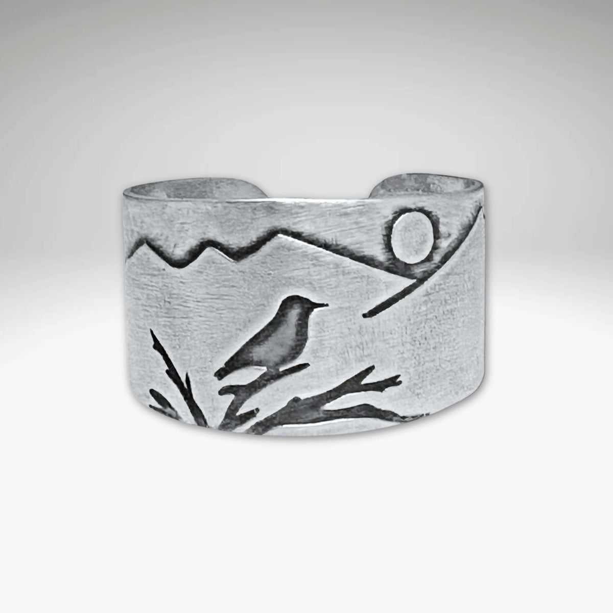 Mtn Bluebird Adjustable Ring featuring a mountainscape and etched bluebird design in silver finish.