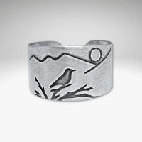 Mtn Bluebird Adjustable Ring featuring a mountainscape and etched bluebird design in silver finish.