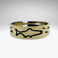 Fishing Adjustable Ring in antique brass with etched fish and wave designs.