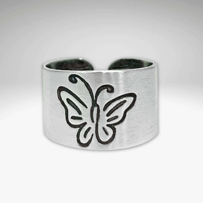 Butterfly Adjustable Ring in Matte Silver, featuring an elegant asymmetrical butterfly design.