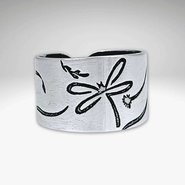 Dragonfly adjustable ring in matte silver, featuring a whimsical design with delicate dragonfly motifs.