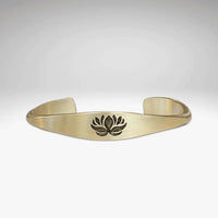 Lotus Signet Cuff Bracelet featuring a lotus motif in a subtle and elegant design.
