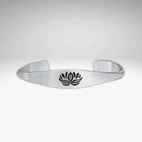 Lotus Signet Cuff Bracelet featuring a lotus motif, symbolizing resilience and inner strength.