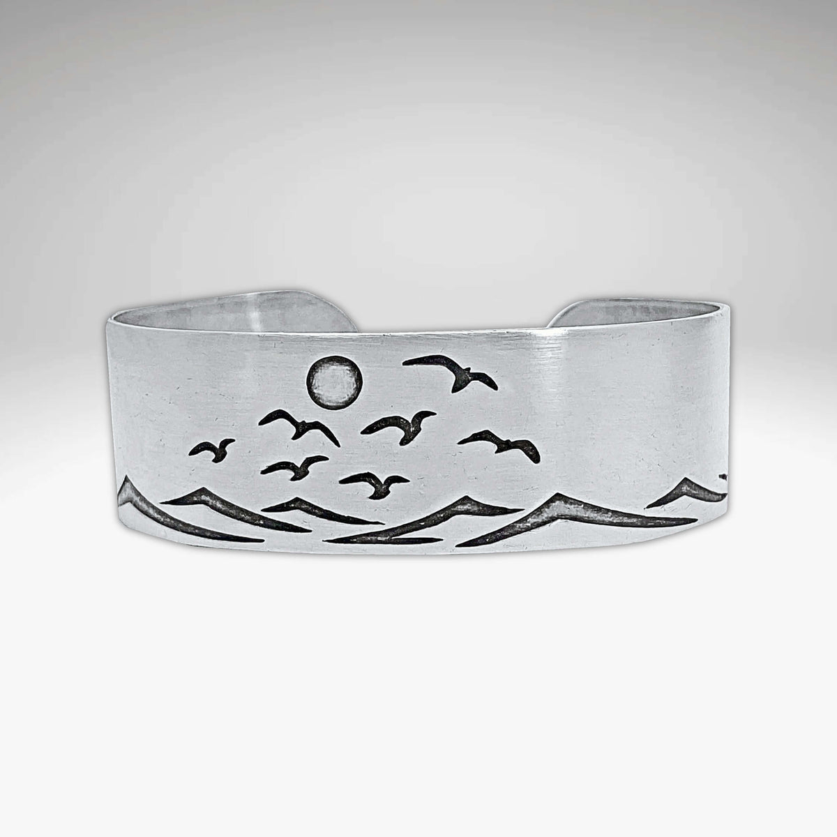 Fly Over 2 Bracelet featuring a serene beach design with waves and birds, capturing a sunny shore atmosphere.
