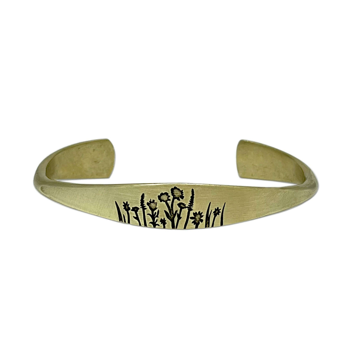 Wildflowers Signet Cuff showcasing delicate floral designs, perfect for lovers of wildflowers and nature-themed jewelry.