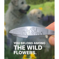 Wildflowers Signet Cuff with floral engraving and dogs in a field of wildflowers.
