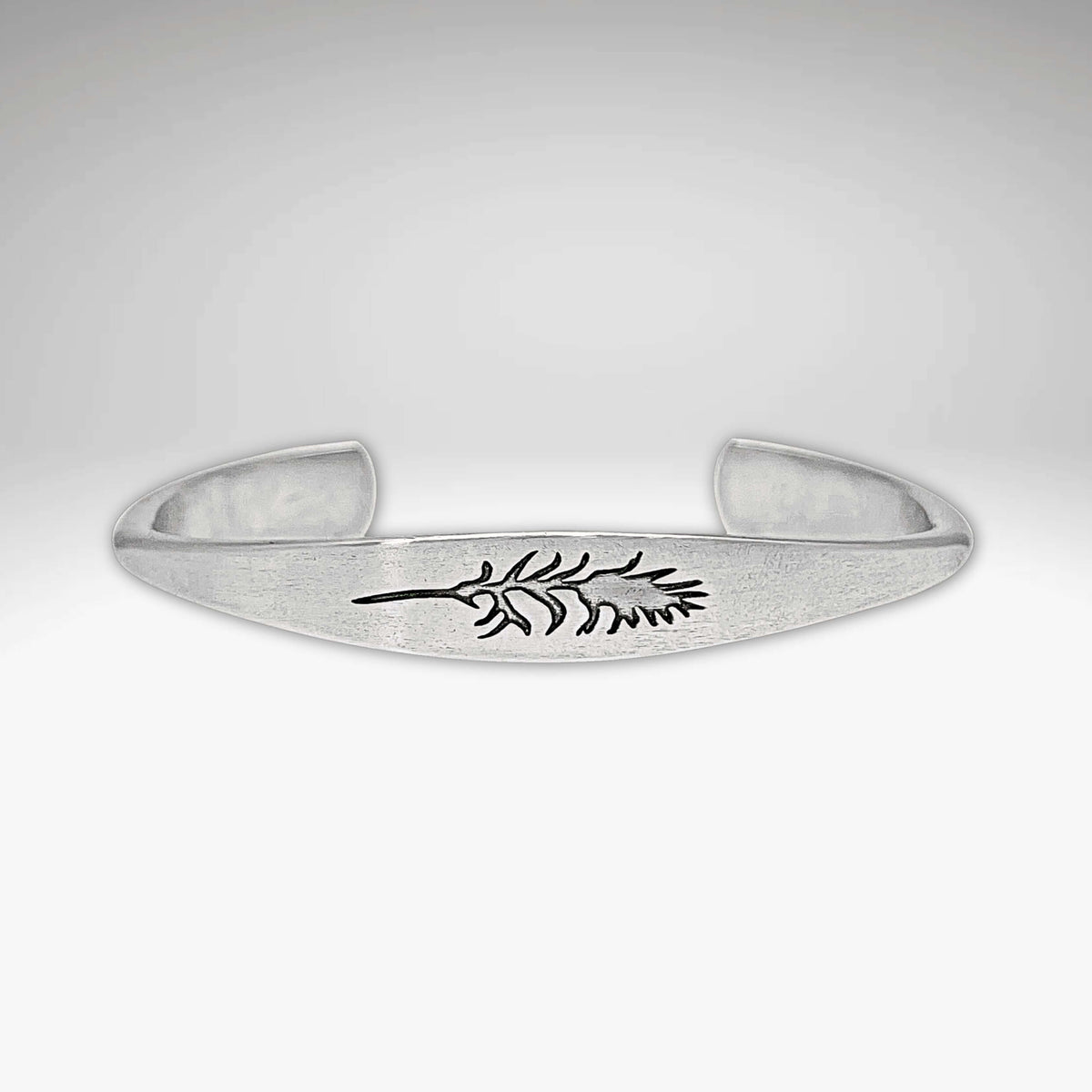 silver cuff bracelet with indian paintbrush flower design