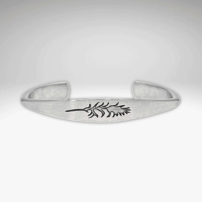 silver cuff bracelet with indian paintbrush flower design