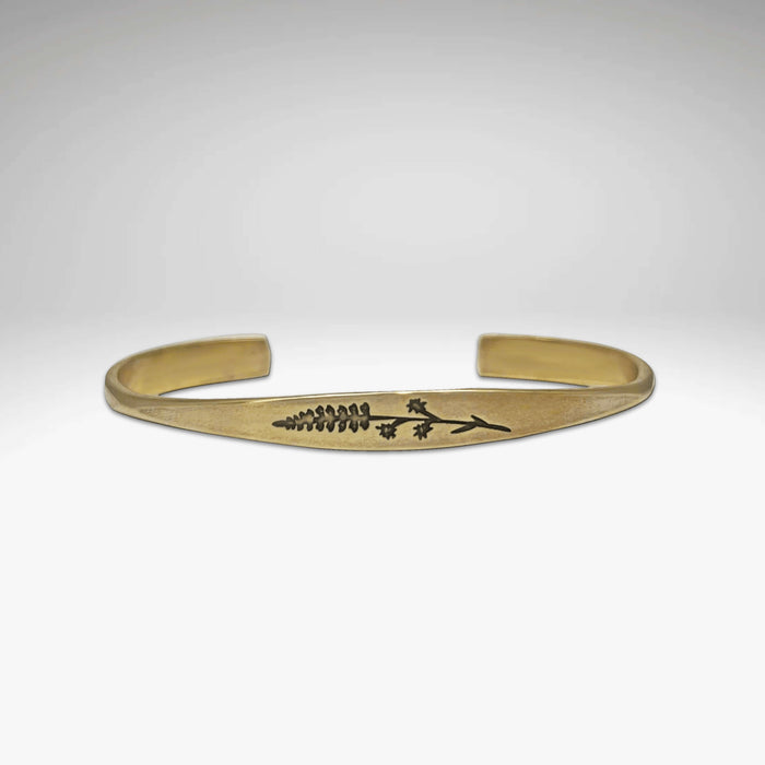 Lupine Flower Cuff Bracelet featuring delicate flower design on adjustable brass cuff, perfect for everyday wear.