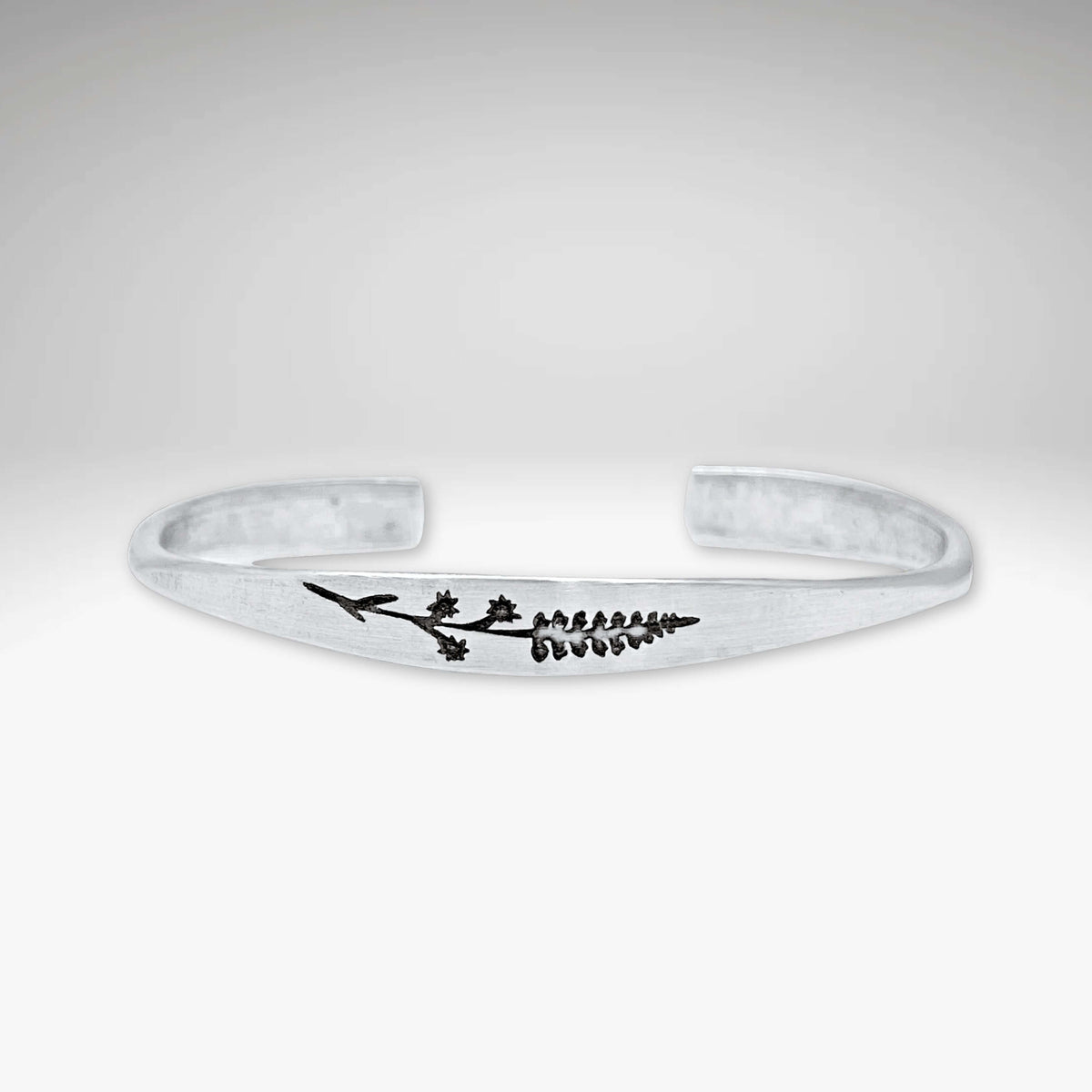 Elegant Lupine Flower Cuff Bracelet in silver, featuring a delicate flower design on a signet cuff.
