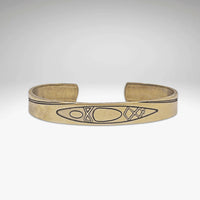 River Run Kayak Cuff Bracelet showcasing a Raw Brass design with kayak etching, adjustable for men and women.
