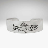 Steelhead Cuff Bracelet featuring an engraved steelhead design, perfect for fly fishing enthusiasts.