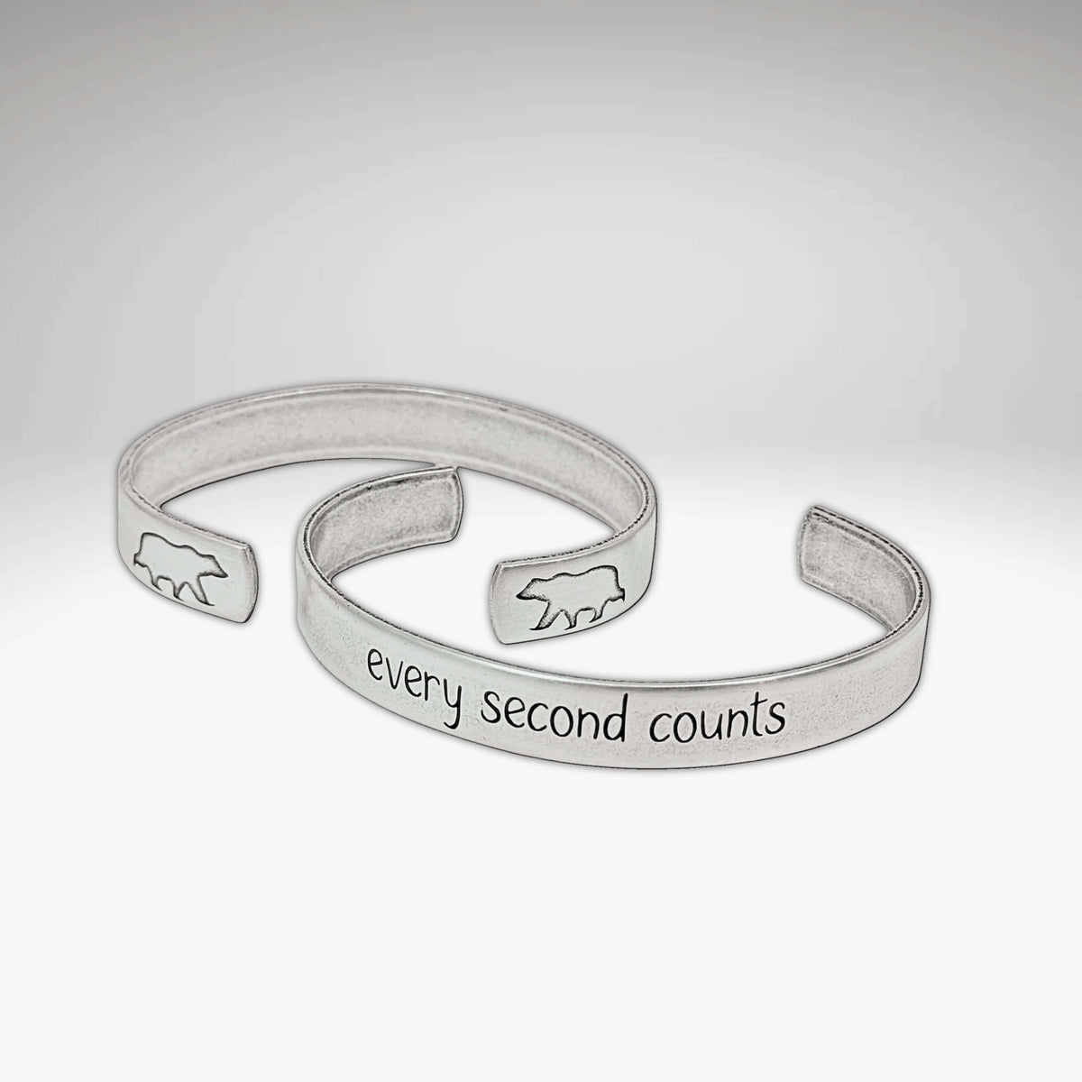 Every second counts - Bear Cuff Bracelet featuring unique etching and bear design on adjustable cuffs.