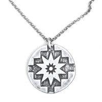 Northstar Necklace featuring a silver pendant with a star design on an adjustable chain.