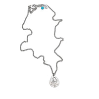 Indian Paintbrush flower necklace on teardrop pendant, featuring a silver chain with an enchanting design.