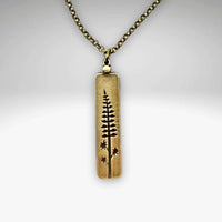 Lupine Necklace featuring a wildflower design, adjustable rolo chain for versatile summer accessory styling.