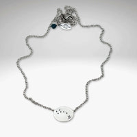 Little Dipper Necklace in Matte Silver showcasing the Ursa Minor constellation stars.