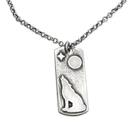 Howl Necklace featuring a wolf, moon, and star design on an adjustable chain.