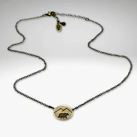 Mountain Bear Necklace in antique brass finish with bear and mountain design, 16-18" adjustable chain, made in Montana.