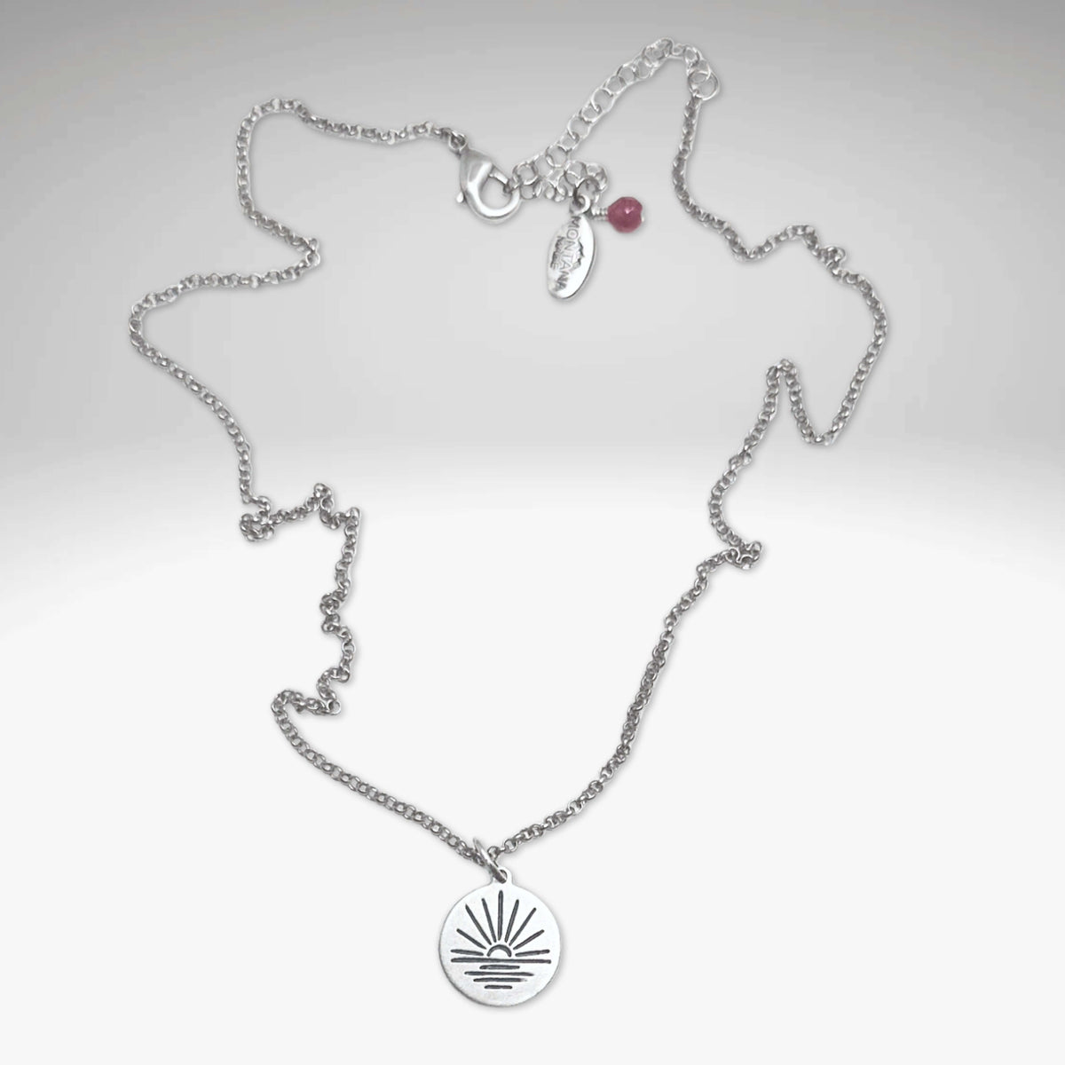 Sunrise Necklace with adjustable rolo chain, featuring a pendant depicting a sunrise over water, in Matte Silver finish.