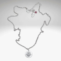 Sunrise Necklace with adjustable rolo chain, featuring a pendant depicting a sunrise over water, in Matte Silver finish.