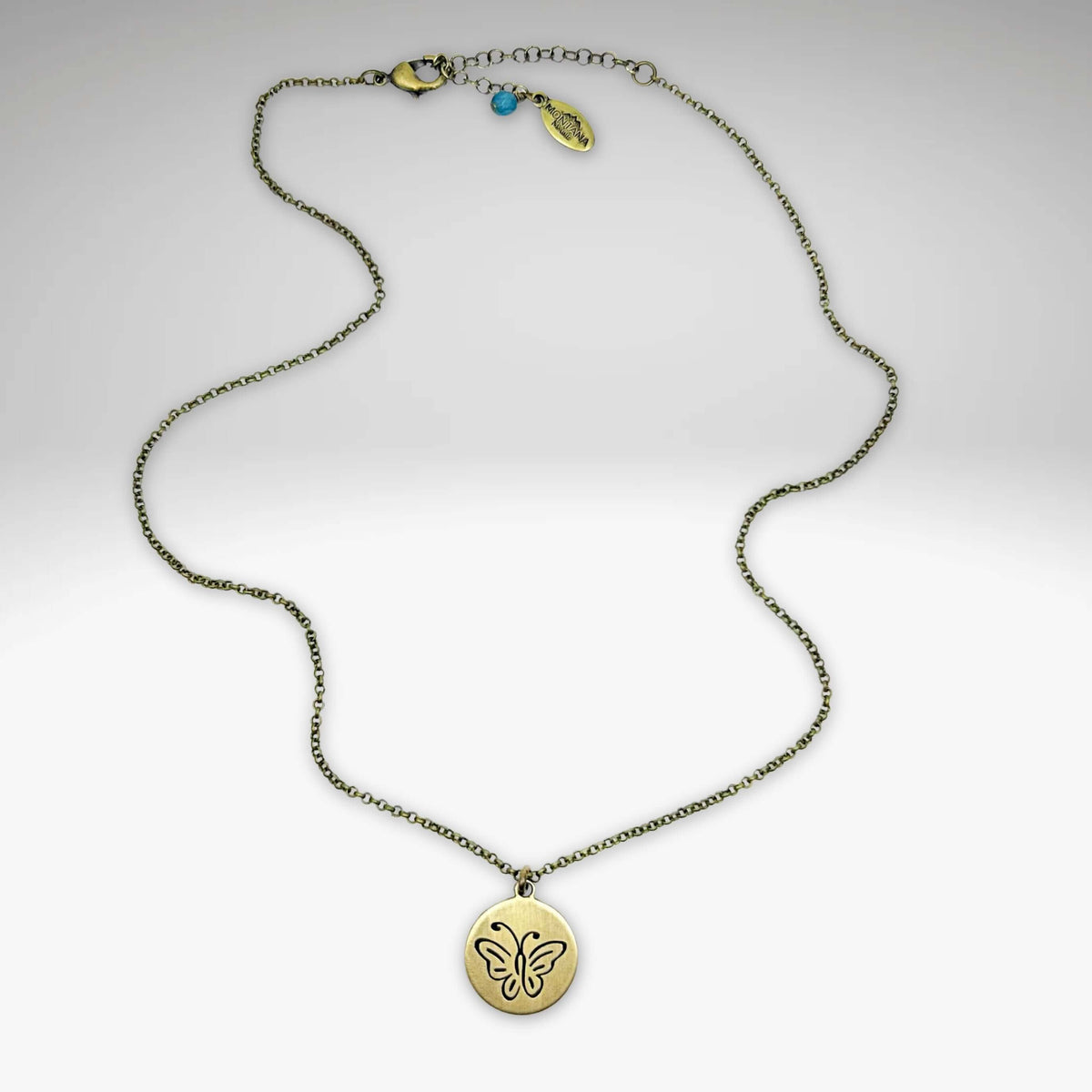 Butterfly necklace with etched pendant on an adjustable rolo chain, ideal for butterfly lovers.