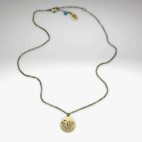 Elegant butterfly necklace with a pendant on a delicate rolo chain, showcasing nature-inspired beauty.