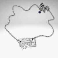Rising Wolf MT Necklace - Topo Montana with topographic design of Montana mountains and a rising wolf.