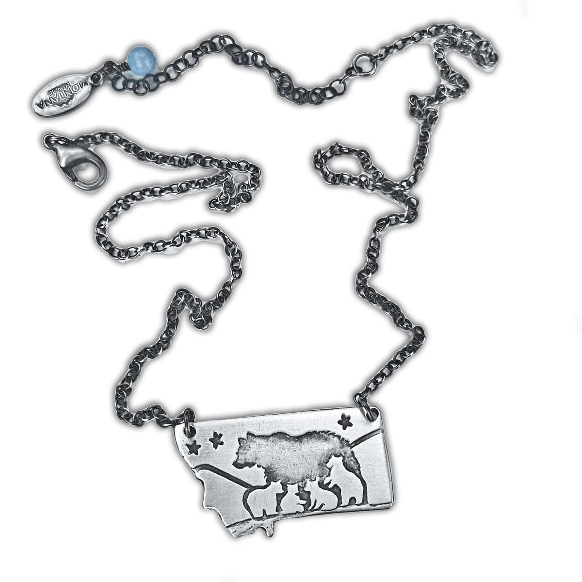 Montana outline pendant with a mama bear and four cubs in matte silver finish on a cable chain.