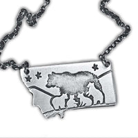 Montana outline pendant with a mama bear and four cubs in matte silver finish on a cable chain.