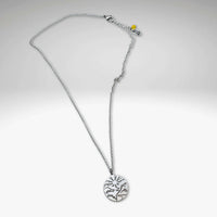 Going to the Sun Necklace pendant in silver, featuring a mountain landscape design, inspired by Glacier National Park.