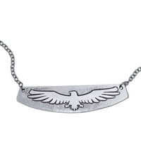 Freebird Necklace featuring a solid brass eagle pendant on an adjustable chain.