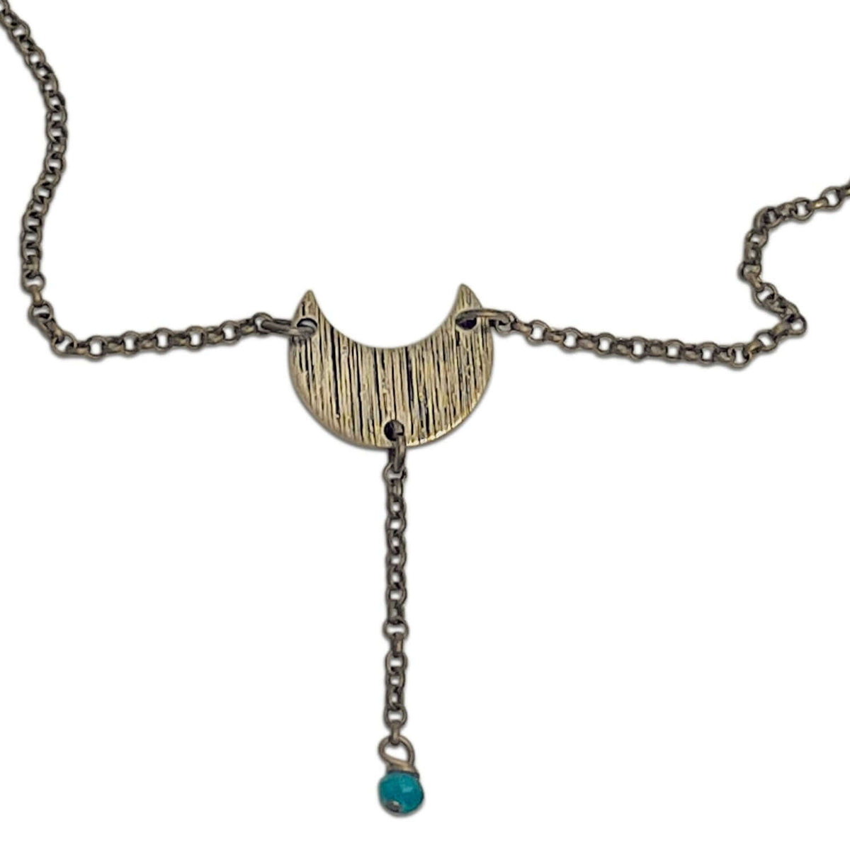 Moonbeam Y Necklace with unique textured moon shape and turquoise accent, perfect for astrology lovers.