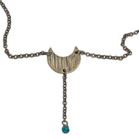 Moonbeam Y Necklace with unique textured moon shape and turquoise accent, perfect for astrology lovers.