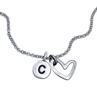 Open Heart Initial Necklace featuring a silver heart charm and initial "C" pendant on a delicate chain.