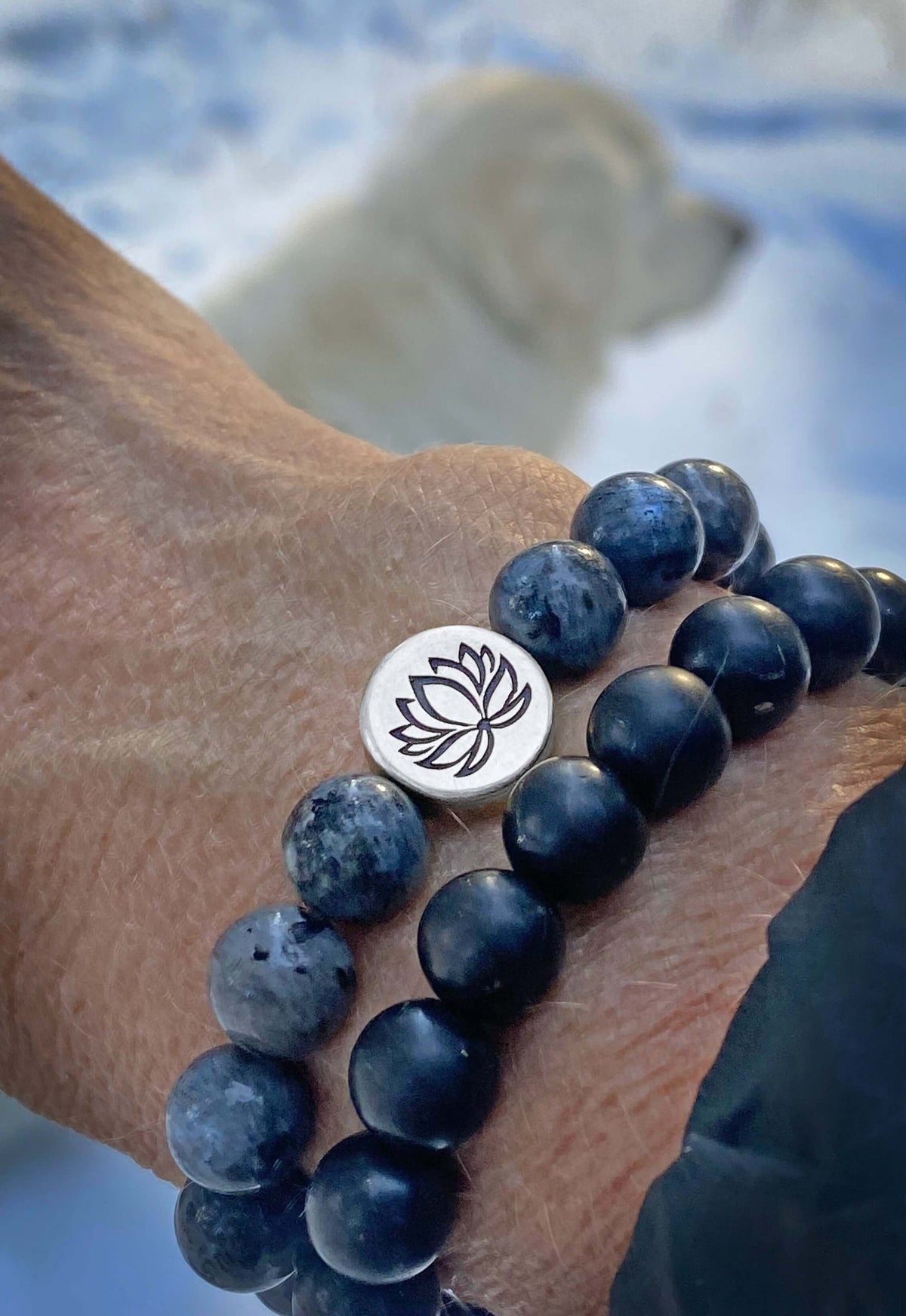 Lotus Stretch Bracelet - Gemstone Beaded Stretchy Bracelet featuring blue beads and lotus charm on wrist.