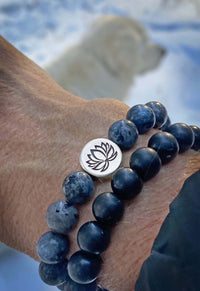 Lotus Stretch Bracelet - Gemstone Beaded Stretchy Bracelet featuring blue beads and lotus charm on wrist.