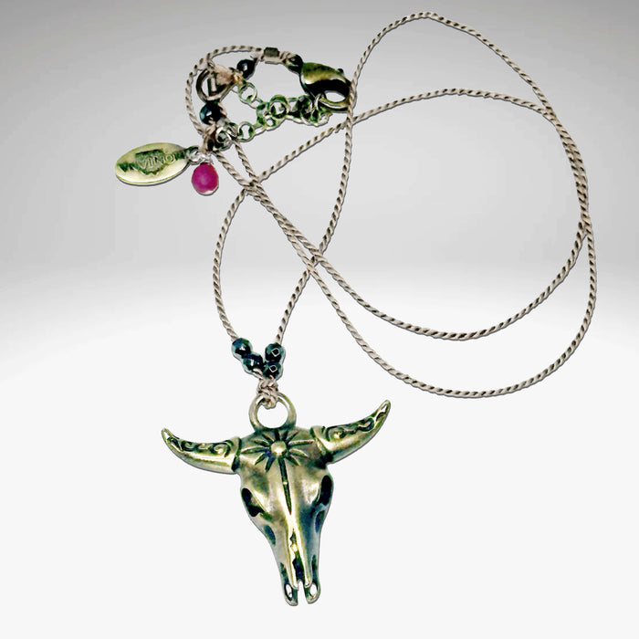Bison Skull Necklace with geometric pendant on silk cord and hematite beads, adjustable length, in antique brass finish