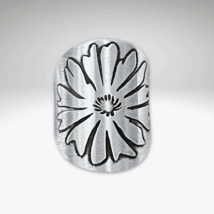 Close-up of a matte silver adjustable ring featuring a bitterroot flower design, handcrafted in Montana.
