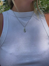 Morel Mushroom Necklace worn by a model, showcasing its unique etched design and natural aesthetic.