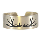 Leather cuff bracelet with antler design in matte silver finish