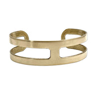 Wide Open Cuff Bracelet in antique brass, a minimalist adjustable design perfect for layering with other jewelry.