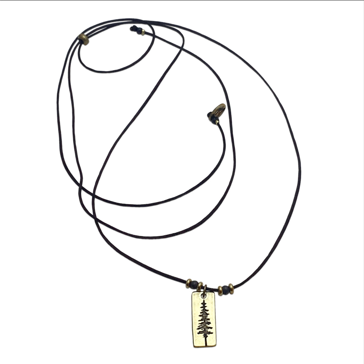 Pine Tree Necklace featuring a Ponderosa Pine pendant on a cord with beads and adjustable length, available in Antique Brass finish.