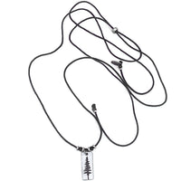 Pine Tree Necklace featuring a pendant with Ponderosa Pine design on a black cord.