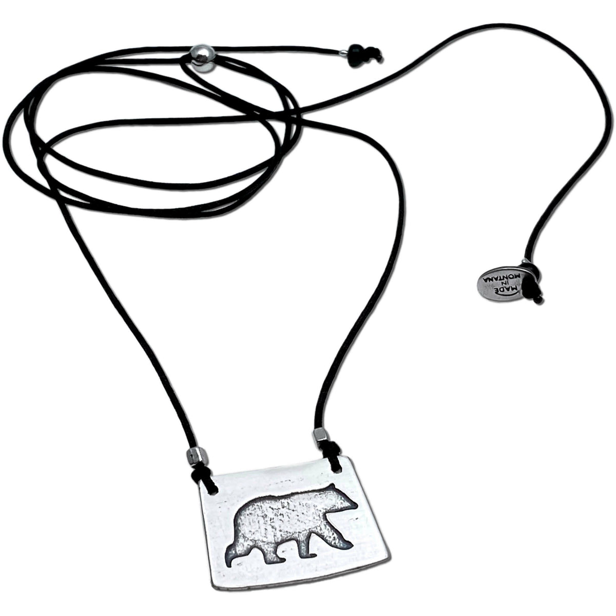 Bear Boy Necklace featuring a black bear design on an adjustable monofilament cord for outdoor enthusiasts.