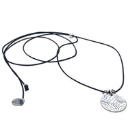 Rising Wolf Necklace featuring a detailed topographic map design on a pendant with a black cord.